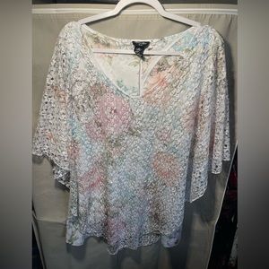 Brittany Black white floral design with lace cover.